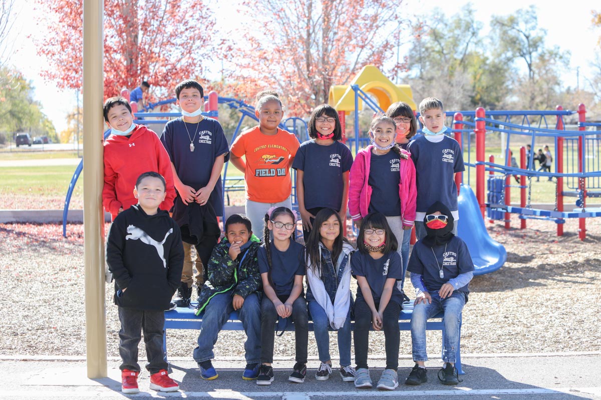 Group of students posing on the playground
